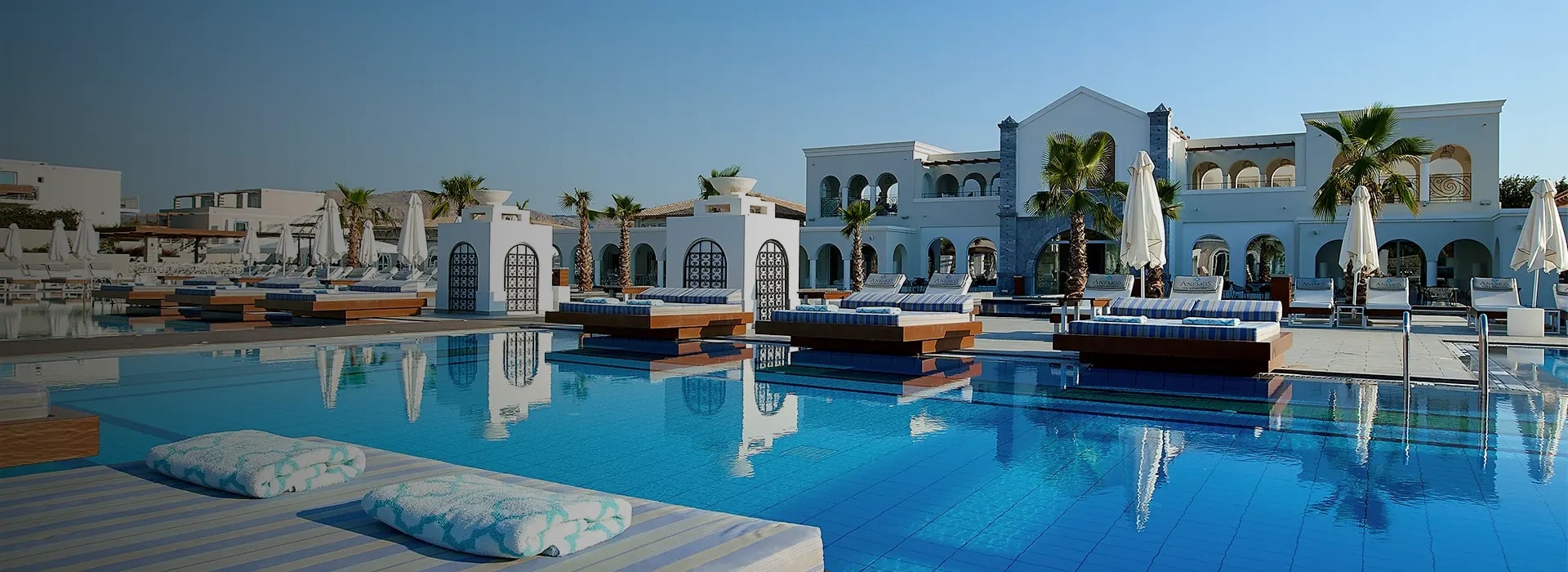<div style="padding-left: 70px;"><img style="width: 100px; height: auto; margin: 25px 0;" src="https://b2ccdn.coraltravel.lv/content/Main Page Hotels Banners Destinations_Greece Lv.svg" loading="lazy"></div>
<div style="padding-left: 70px; margin-bottom: 20px;"><img style="width: 200px; height: auto;" src="https://b2ccdn.coraltravel.lt/content/logos/hotel-logos/anemos-w200px copy.webp" loading="lazy"></div>
<div style="font-size: 28px; font-weight: 600; padding-left: 70px;">ANEMOS LUXURY GRAND RESORT</div>