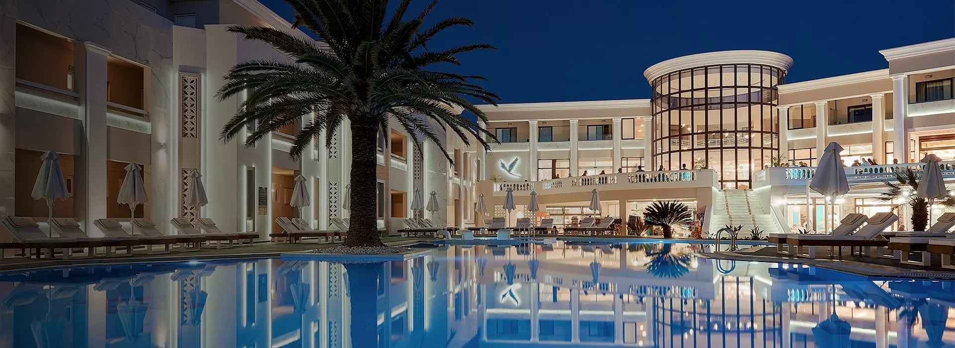 <div style="padding-left: 70px;"><img style="width: 100px; height: auto; margin: 25px 0;" src="https://b2ccdn.coraltravel.lv/content/Main Page Hotels Banners Destinations_Greece Lv.svg" loading="lazy"></div>
<div style="padding-left: 70px; margin-bottom: 20px;"><img style="width: 200px; height: auto;" src="https://b2ccdn.coraltravel.lt/content/logos/hotel-logos/mythos-w200px copy.webp" loading="lazy"></div>
<div style="font-size: 28px; font-weight: 600; padding-left: 70px;">MYTHOS PALACE RESORT &amp; SPA</div>